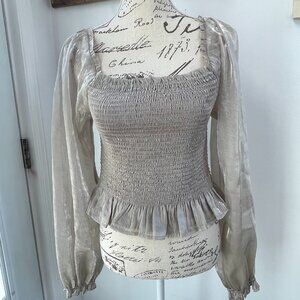 NEW shiny gold long sleeve top size L with sheer sleeves